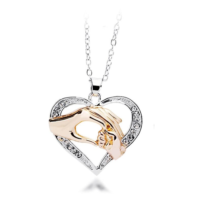 MOTHER HOLDING BABY'S HAND HEART NECKLACE